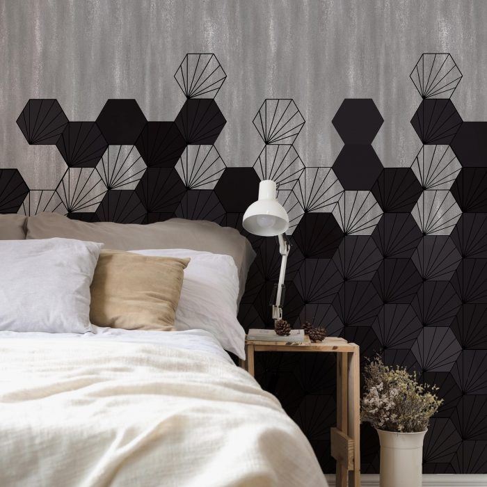 black concrete tiles geometric design set against a concrete background. Custom digitally printed wallcovering for commercial interiors.