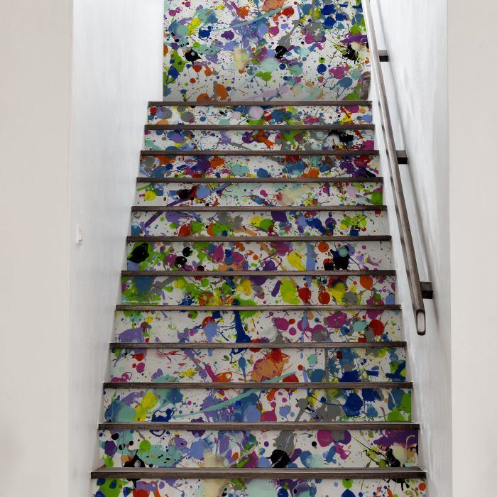 A fun brightly coloured paint splattered Jackson Pollock inspired wall covering
