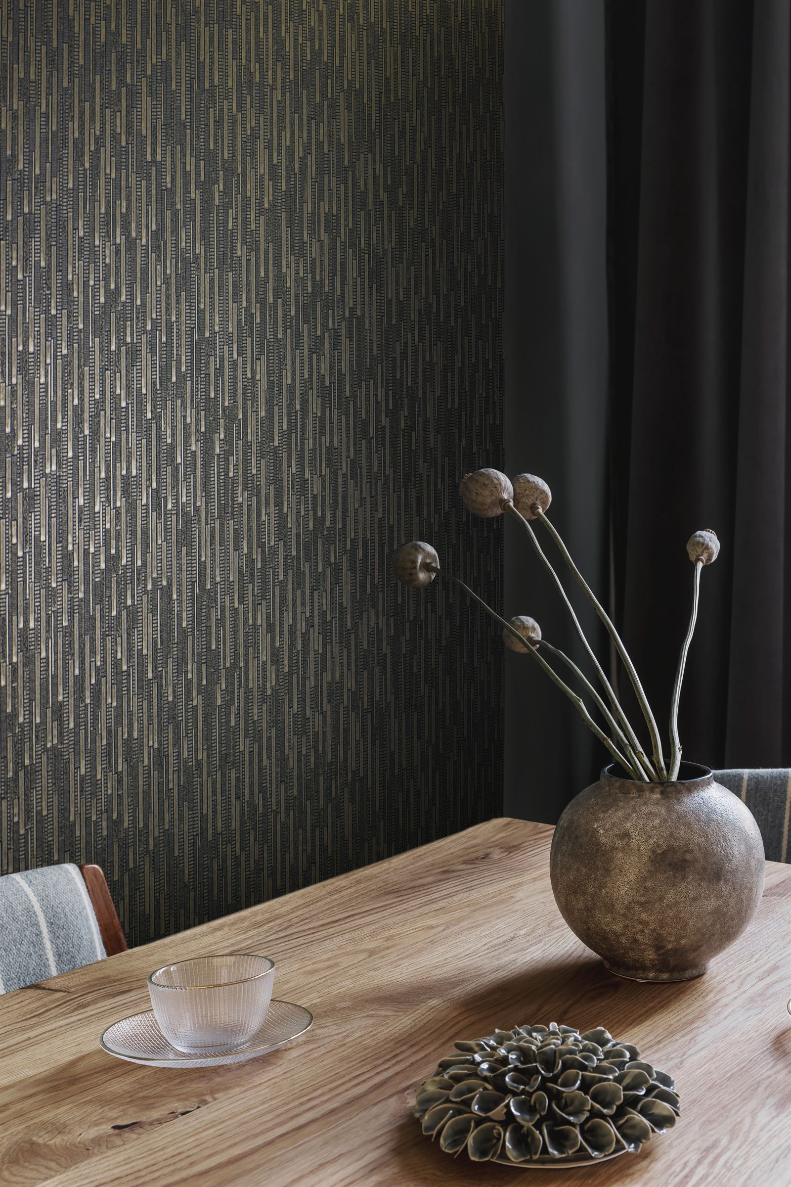 metallic wallcovering with deeply textured vertical stacked blocks which catch the light from every angle in a hotel interior